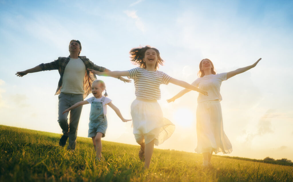 Happy family on summer walk